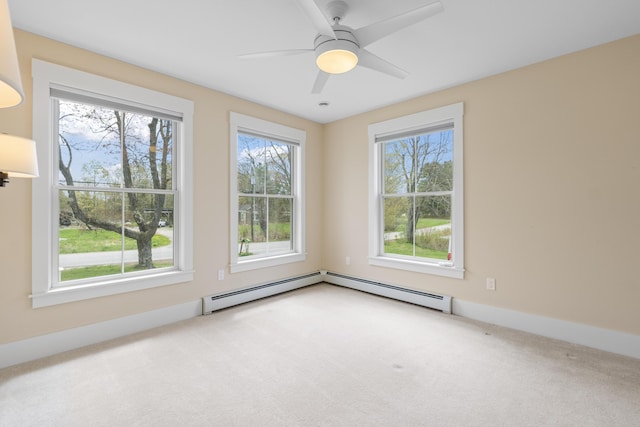 246 Coombs Rd, Brunswick, ME 04011 - spare room with healthy amount of natural light, carpet floors, a ceiling fan, and baseboards
