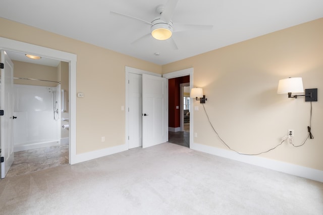 246 Coombs Rd, Brunswick, ME 04011 - unfurnished bedroom with carpet, baseboards, a closet, ceiling fan, and ensuite bath