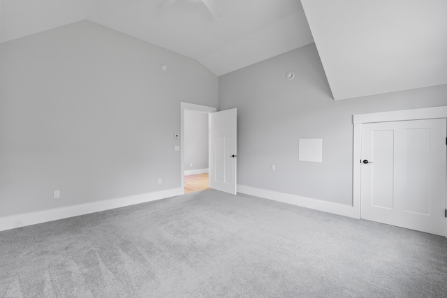 246 Coombs Rd, Brunswick, ME 04011 - additional living space featuring carpet floors, baseboards, and high vaulted ceiling