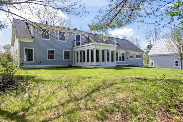 246 Coombs Rd, Brunswick, ME 04011 - rear view of property with a balcony, a yard, a shingled roof, and a sunroom
