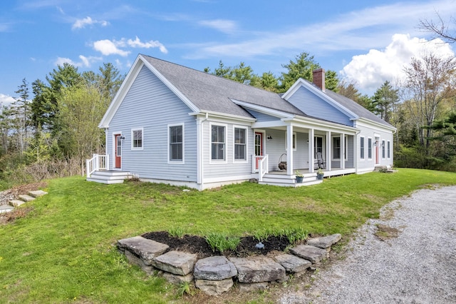 246 Coombs Rd, Brunswick, ME 04011 - view of front facade with a chimney, a porch, a front lawn, and roof with shingles