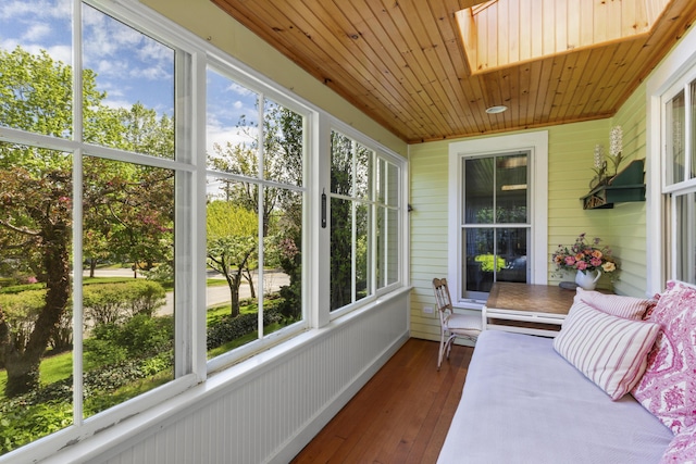 37 Mountain St, Camden, ME 04843 - sunroom with wooden ceiling, wooden walls, hardwood / wood-style floors, and a skylight