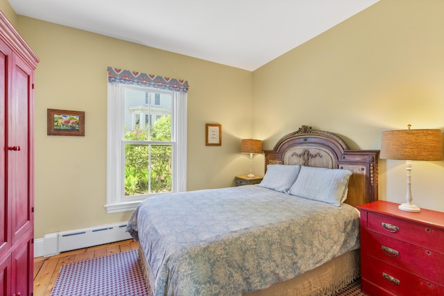 37 Mountain St, Camden, ME 04843 - bedroom with a baseboard heating unit and hardwood / wood-style flooring