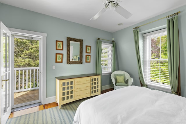 37 Mountain St, Camden, ME 04843 - bedroom with access to exterior, multiple windows, and baseboards
