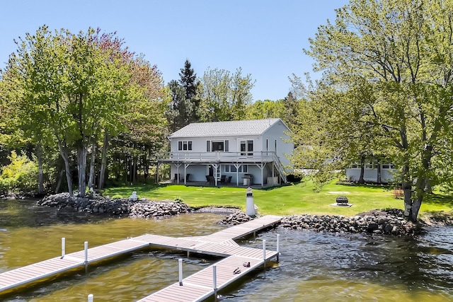 117 Pinkhams Cove Rd, Belgrade, ME 04917 - dock area with a lawn and a water view