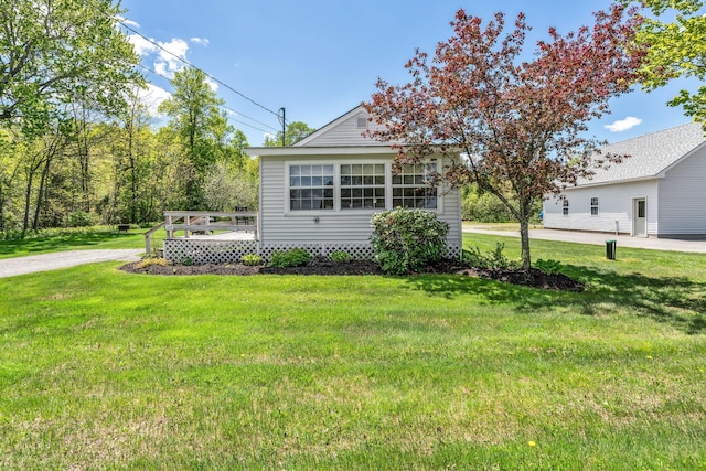 117 Pinkhams Cove Rd, Belgrade, ME 04917 - view of side of property featuring a yard and a wooden deck