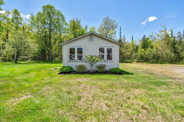 117 Pinkhams Cove Rd, Belgrade, ME 04917 - view of side of home with a yard