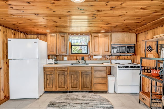 117 Pinkhams Cove Rd, Belgrade, ME 04917 - kitchen with white appliances, a sink, wood ceiling, wood walls, and light countertops