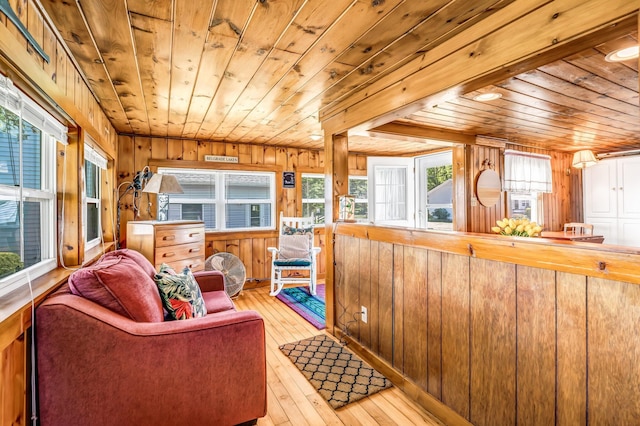 117 Pinkhams Cove Rd, Belgrade, ME 04917 - living room featuring wooden ceiling, light wood-style flooring, and wood walls