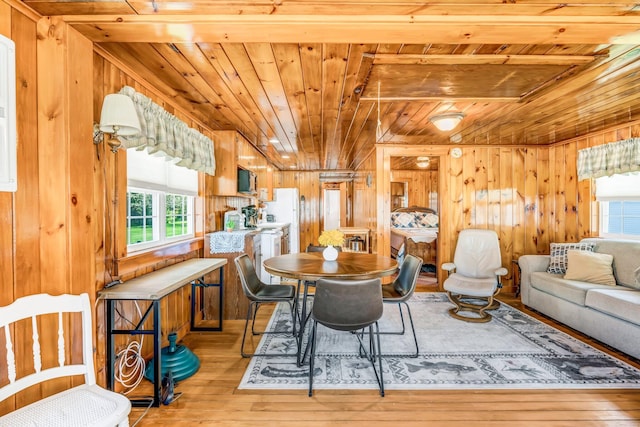 117 Pinkhams Cove Rd, Belgrade, ME 04917 - dining area with wooden ceiling, healthy amount of natural light, hardwood / wood-style floors, and wood walls