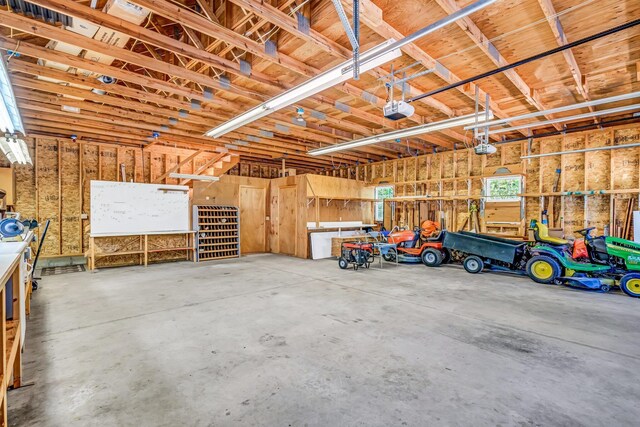 117 Pinkhams Cove Rd, Belgrade, ME 04917 - garage with a garage door opener