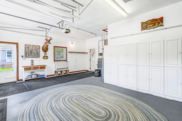 117 Pinkhams Cove Rd, Belgrade, ME 04917 - garage featuring a garage door opener