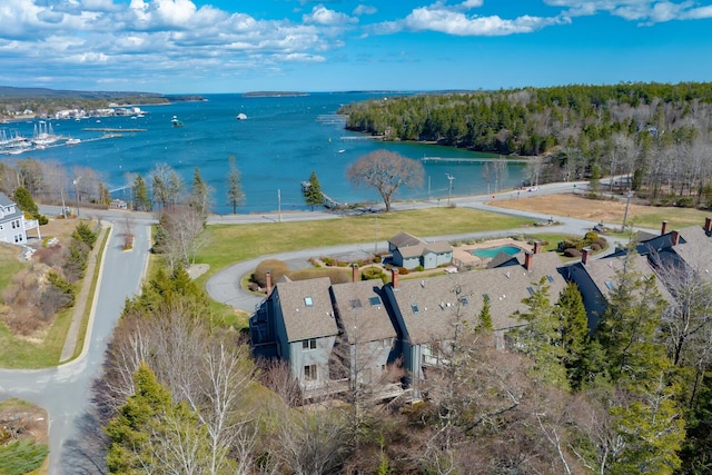 aerial view of property's location with a large body of water