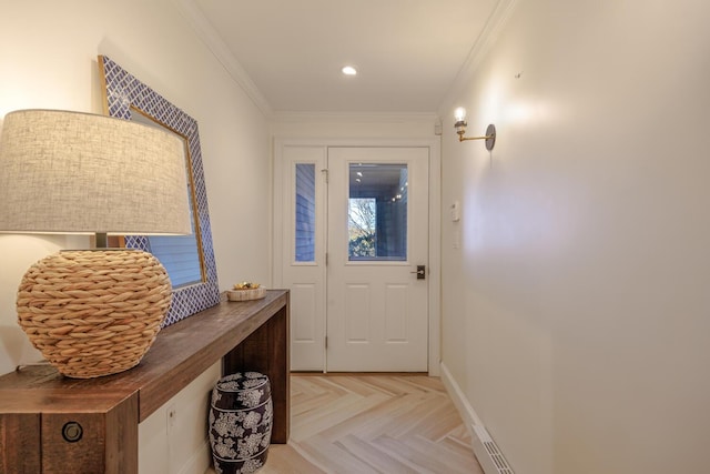 doorway with crown molding, baseboards, and recessed lighting