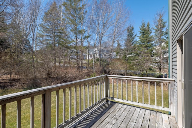 deck featuring a lawn