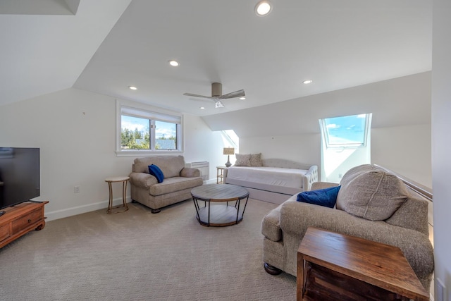 carpeted living area with lofted ceiling, ceiling fan, recessed lighting, and baseboards