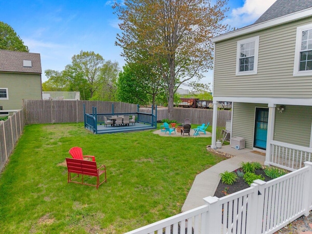107 Elm St, South Portland, ME 04106 - view of yard featuring an outdoor fire pit and a patio