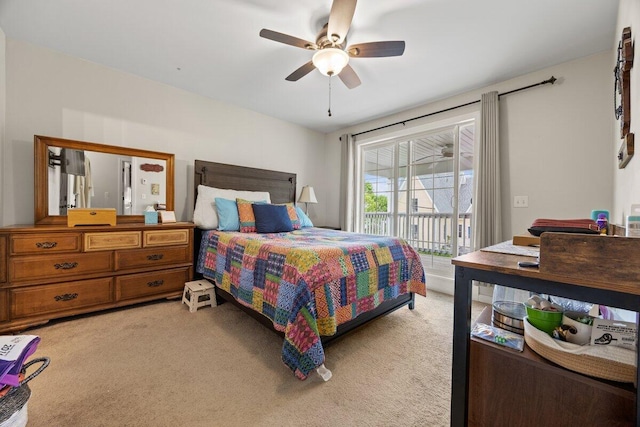 107 Elm St, South Portland, ME 04106 - bedroom featuring access to outside, light colored carpet, and a ceiling fan
