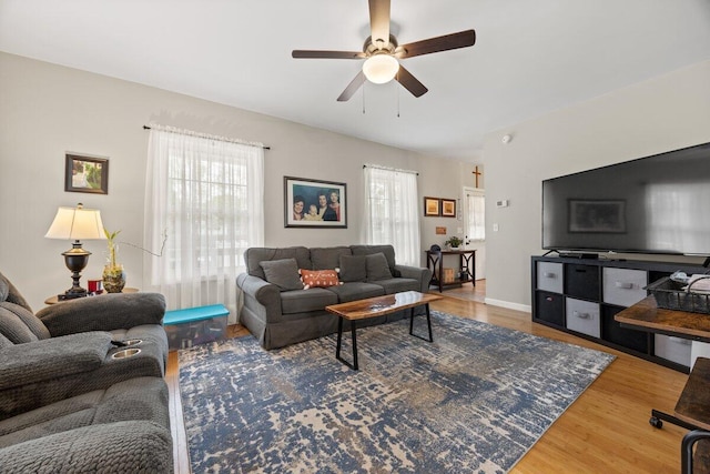 107 Elm St, South Portland, ME 04106 - living room featuring a ceiling fan, wood finished floors, and plenty of natural light
