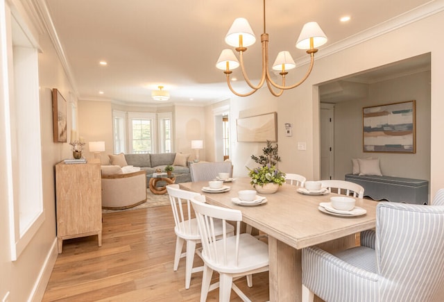 104 Woodbridge Rd, York, ME 03909 - dining room with ornamental molding, light wood-style flooring, recessed lighting, a chandelier, and baseboards