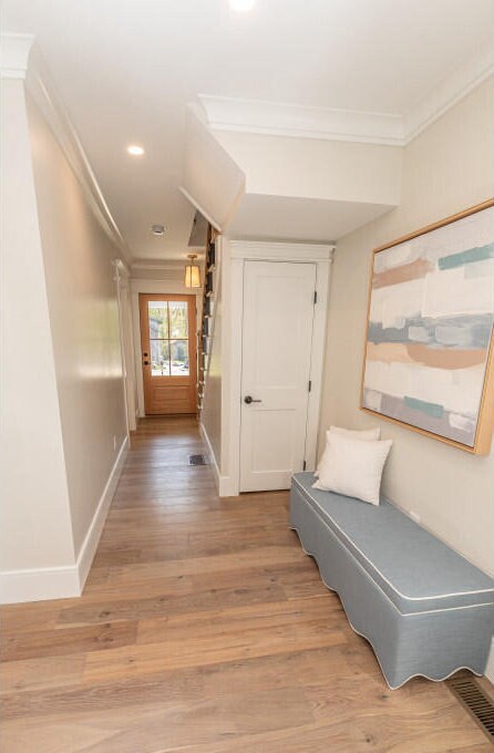 104 Woodbridge Rd, York, ME 03909 - hall with crown molding, light wood-style flooring, recessed lighting, and baseboards