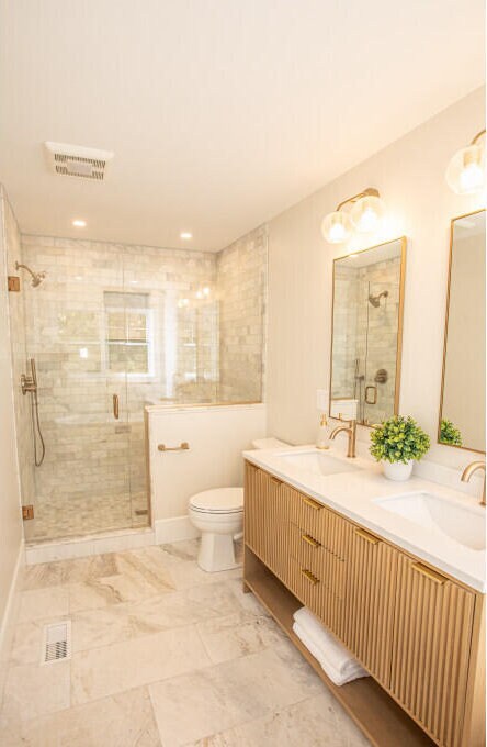 104 Woodbridge Rd, York, ME 03909 - bathroom with a stall shower, toilet, and double vanity