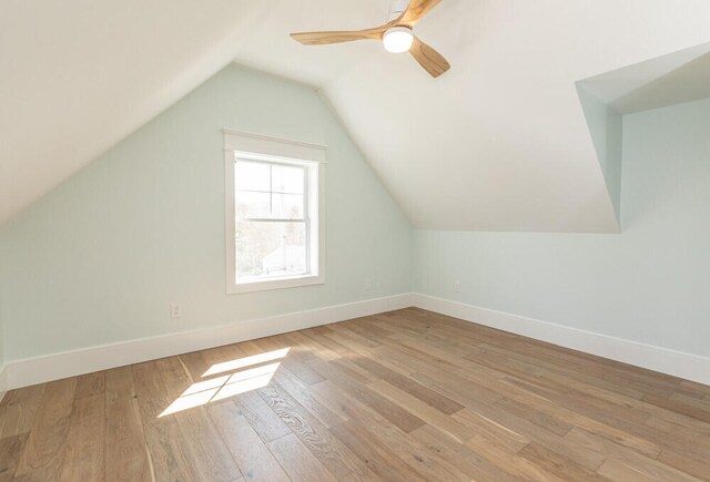 104 Woodbridge Rd, York, ME 03909 - additional living space with wood finished floors, lofted ceiling, baseboards, and ceiling fan