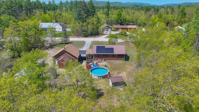 19 Pine Acres Dr, Cornish, ME 04020 - view of subject property featuring a forest and a pool