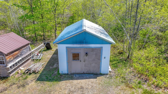 19 Pine Acres Dr, Cornish, ME 04020 - view of shed with a wooded view