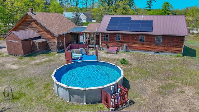 19 Pine Acres Dr, Cornish, ME 04020 - view of swimming pool featuring an outbuilding, a shed, and a jacuzzi