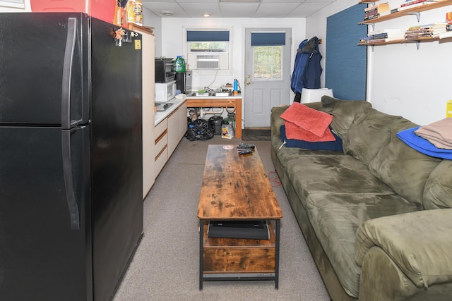 19 Pine Acres Dr, Cornish, ME 04020 - carpeted living room featuring a drop ceiling and cooling unit