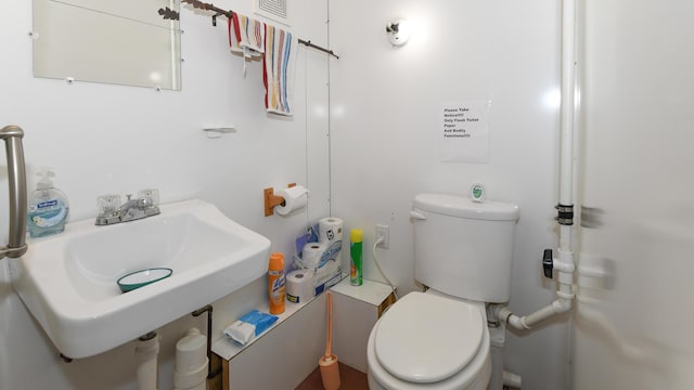 19 Pine Acres Dr, Cornish, ME 04020 - bathroom with toilet and a sink