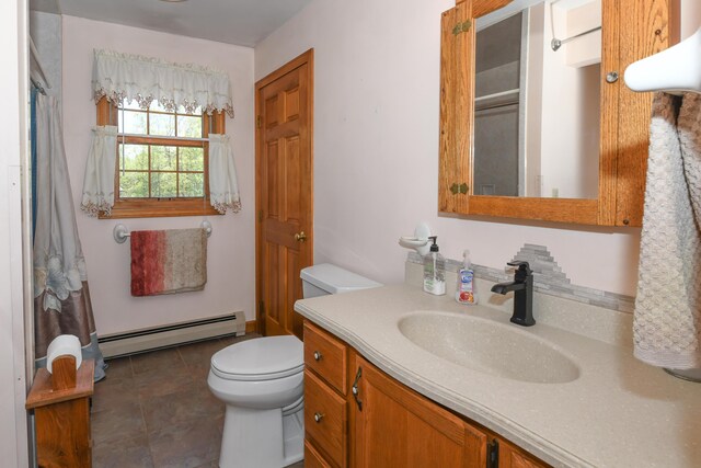 19 Pine Acres Dr, Cornish, ME 04020 - bathroom with baseboard heating, toilet, vanity, and a shower with shower curtain