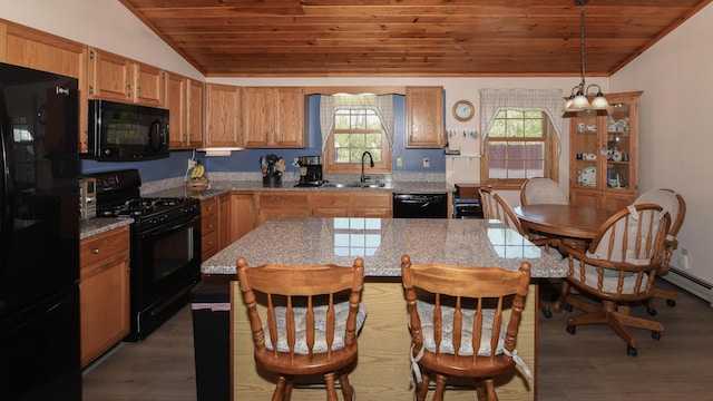 19 Pine Acres Dr, Cornish, ME 04020 - kitchen featuring black appliances, wooden ceiling, lofted ceiling, wood finished floors, and a kitchen breakfast bar