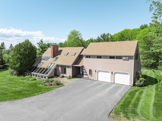 28 Meadow Ln, Brewer, ME 04412 - a-frame style home with a chimney, driveway, a front lawn, and roof with shingles