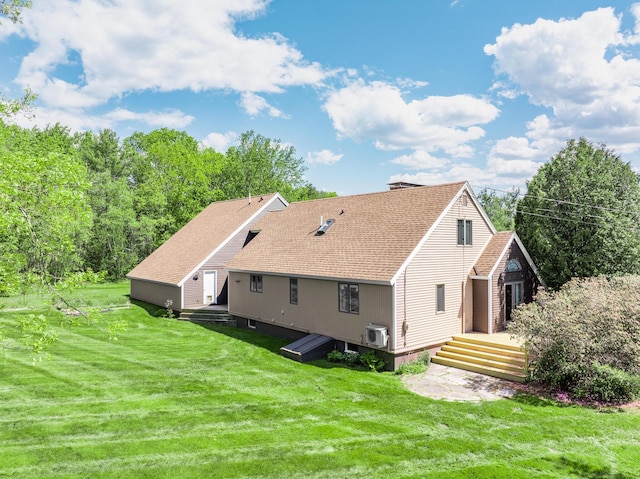 28 Meadow Ln, Brewer, ME 04412 - rear view of property with a deck, a yard, roof with shingles, and a chimney