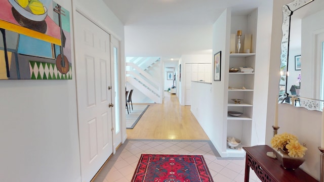 28 Meadow Ln, Brewer, ME 04412 - hall featuring tile patterned floors and stairs