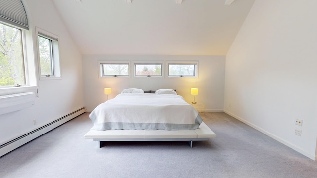 28 Meadow Ln, Brewer, ME 04412 - carpeted bedroom with a baseboard radiator, vaulted ceiling, multiple windows, and baseboards