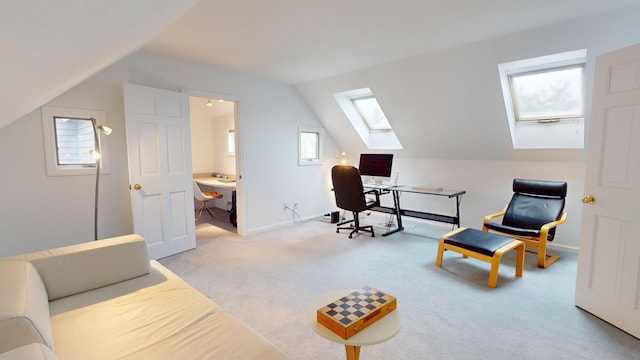 28 Meadow Ln, Brewer, ME 04412 - office space with a skylight, vaulted ceiling, light colored carpet, and baseboards
