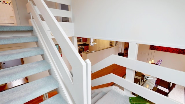 28 Meadow Ln, Brewer, ME 04412 - staircase featuring carpet floors