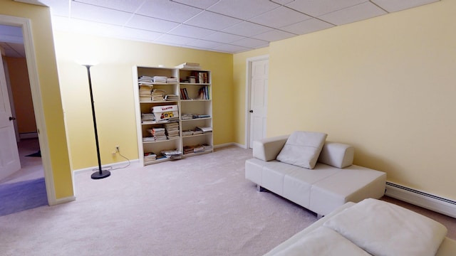 28 Meadow Ln, Brewer, ME 04412 - living area with carpet, a baseboard radiator, a paneled ceiling, and baseboards