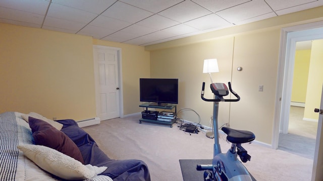 28 Meadow Ln, Brewer, ME 04412 - exercise room featuring carpet floors, a baseboard radiator, baseboards, and a paneled ceiling