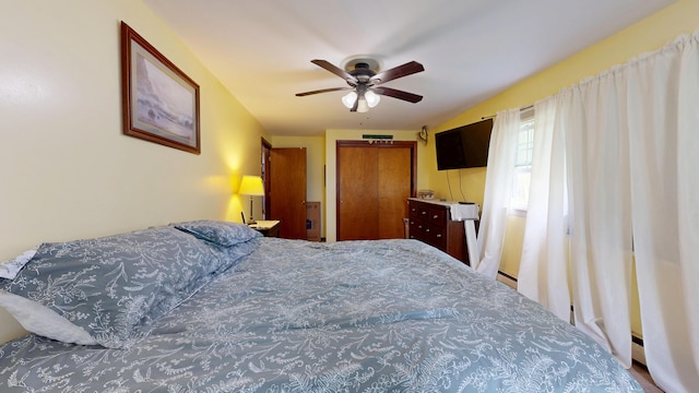 76 School St, Baldwin, ME 04024 - bedroom with a ceiling fan, a closet, and baseboard heating