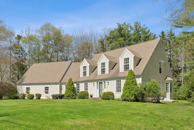 30 Fairfield Dr, Kennebunk, ME 04043 - cape cod house with a front yard and roof with shingles