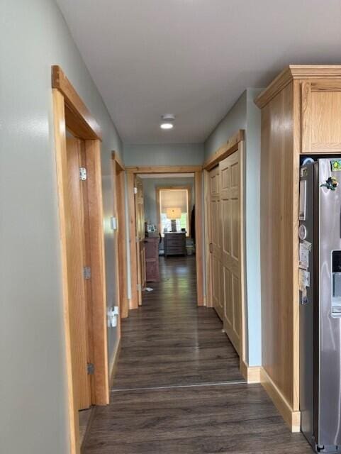 1027 Gardner Creek Rd, Wade, ME 04786 - hall featuring dark wood-type flooring and baseboards