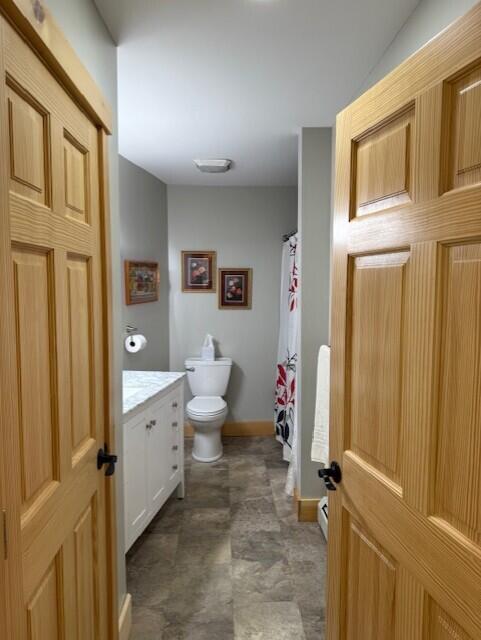 1027 Gardner Creek Rd, Wade, ME 04786 - bathroom featuring vanity and a shower with shower curtain