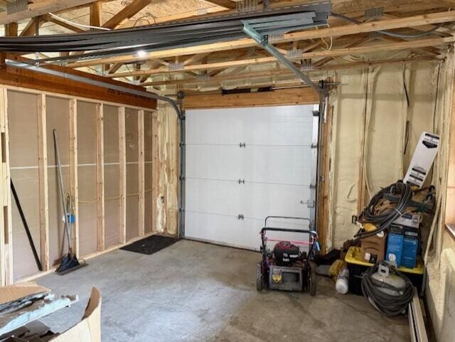 1027 Gardner Creek Rd, Wade, ME 04786 - garage featuring baseboard heating