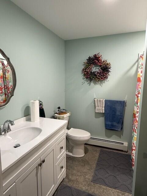 1027 Gardner Creek Rd, Wade, ME 04786 - full bath featuring a baseboard heating unit and vanity
