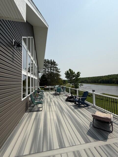 1027 Gardner Creek Rd, Wade, ME 04786 - wooden terrace featuring a water view and outdoor dining area