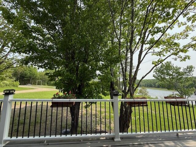 1027 Gardner Creek Rd, Wade, ME 04786 - wooden terrace featuring a water view and a lawn